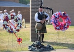 Tom Metz, a bagpiper and retired Lt. Col. from the United States Army, performs Amazing Grace during the annual Norfolk Naval Shipyard Memorial Day Fall-In for Colors May 26.