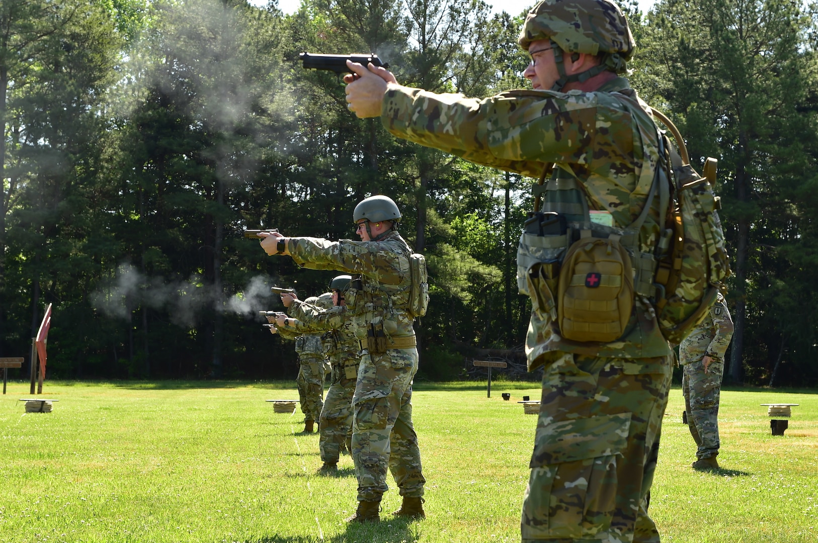 During a timed event, National Guard competitors fire rapidly at targets May 19, 2021, during the 2021 Chief, National Guard Bureau Postal Matches at Camp Butner, Hampton, North Carolina.