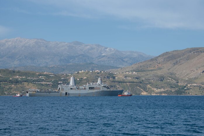 ) The amphibious transport dock ship USS San Antonio (LPD 17) arrives in Souda Bay, Greece, for a scheduled logistics and maintenance stop , May 27, 2021. San Antonio is operating in the U.S. Sixth Fleet area of operations with Amphibious Squadron 4 and the 24th Marine Expeditionary Unit (MEU) as part of the Iwo Jima Amphibious Readiness Group. NSA Souda Bay is an operational ashore base that enables U.S., allied, and partner nation forces to be where they are needed when they are needed to ensure security and stability in Europe, Africa, and Southwest Asia.