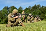 National Guard competitors fire on line from the kneeling position May 19, 2021, during the 2021 Chief, National Guard Bureau Postal Matches at Camp Butner, Hampton, North Carolina.
