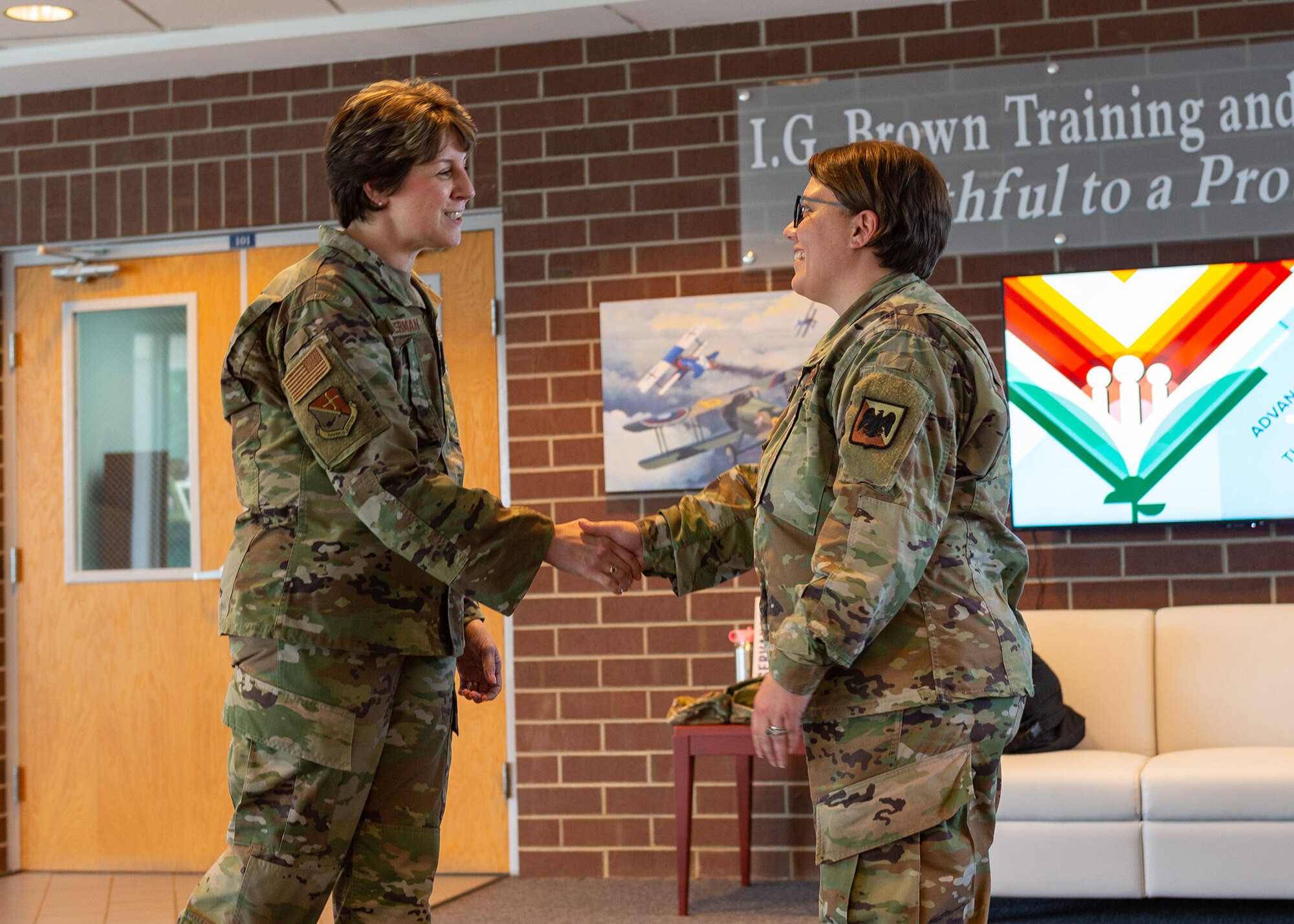 Chief Timmerman thanking Airman