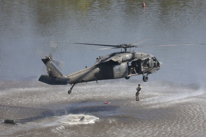 U.S. Army Rangers participate in the Combat Water Survival Assessment in the 2021 Best Ranger Competition on Fort Benning, Georgia, April 18, 2021.