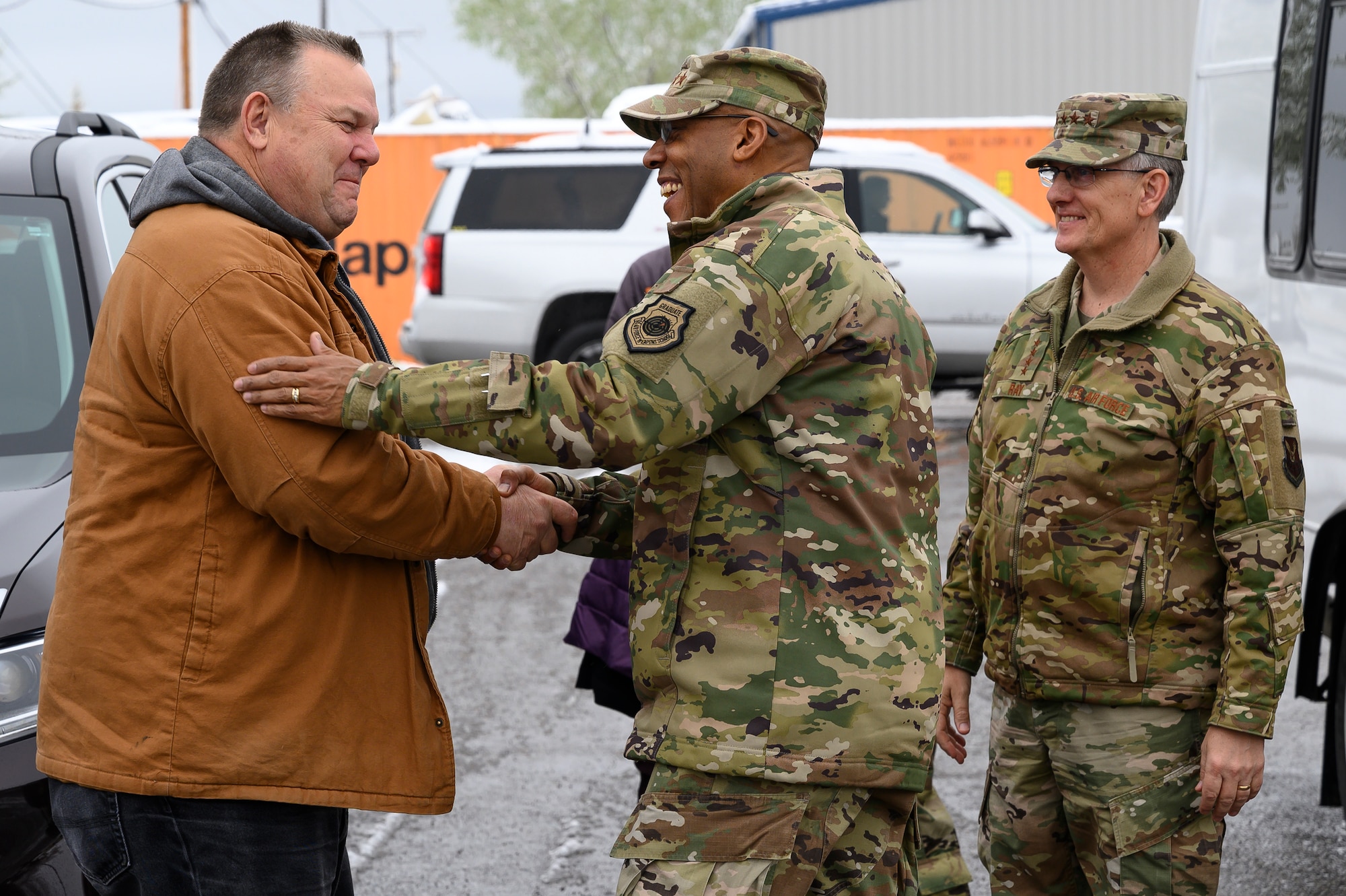 Air Force Chief of Staff Gen. CQ. Brown, Jr., center, meets U.S. Senator Jon Tester left, with Gen. Timothy M. Ray, right, Air Force Global Strike Command commander, May 21, 2021, at Malmstrom Air Force Base, Mont.