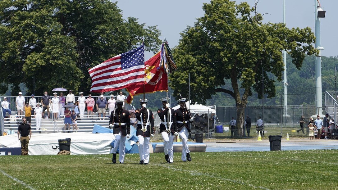 Marines with the Official U.S. Marine Corps Color Guard perform during a Battle Color Ceremony as part of the U.S. Naval Academy Commissioning Week at the United States Naval Academy, Annapolis, Maryland, May 26, 2021