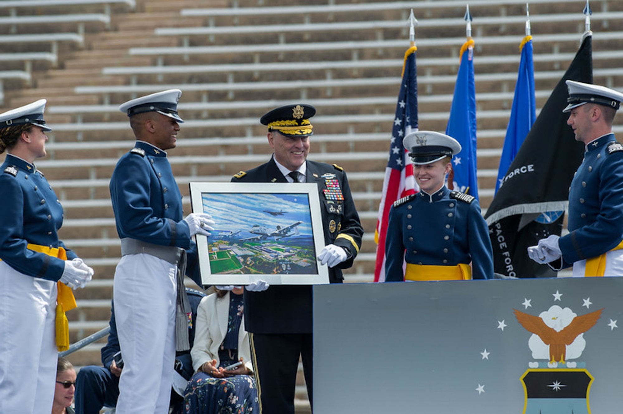 Cadets present the class gift during the U.S. Air Force Academy Class of 2021 Graduation Ceremony at the Air Force Academy in Colorado Springs, Colo., May 26, 2021.