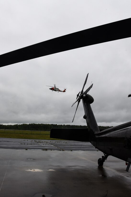 Virginia National Guard aviators participate in an air operations exercise managed by the Virginia Department of Emergency Management May 10, 2021, at the Army Aviation Support Facility in Sandston, Virginia. The exercise aimed to test a new smart phone-enabled mission-management platform designed for use during a large-scale emergency response effort, such as a hurricane. With the potential for air support from multiple agencies, all on different communications platforms, the new program aims to simplify mission assignment and reporting efforts. In addition to VNG and VDEM personnel, the training included members of the U.S. Coast Guard, the Virginia State Police, the Federal Aviation Administration, the North Carolina National Guard and the North Carolina Department of Public Safety. The training also allowed for a test of loading and using communications by air crews and helicopter crews from VNG, VSP and USCG tested the new platform during a simulated response exercise. (U.S. Army National Guard photo by Sgt. 1st Class Terra C. Gatti)