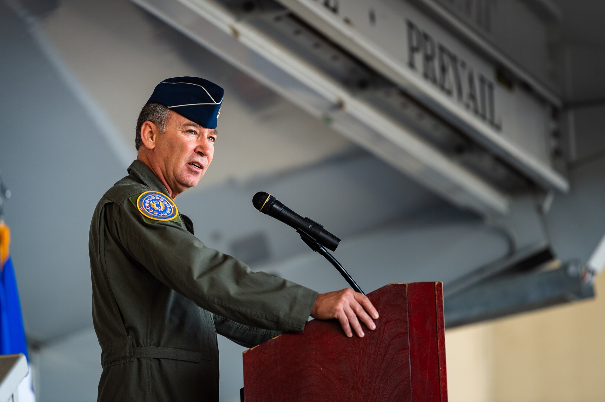 A photo of the 15th Air Force commander speaking at a podium