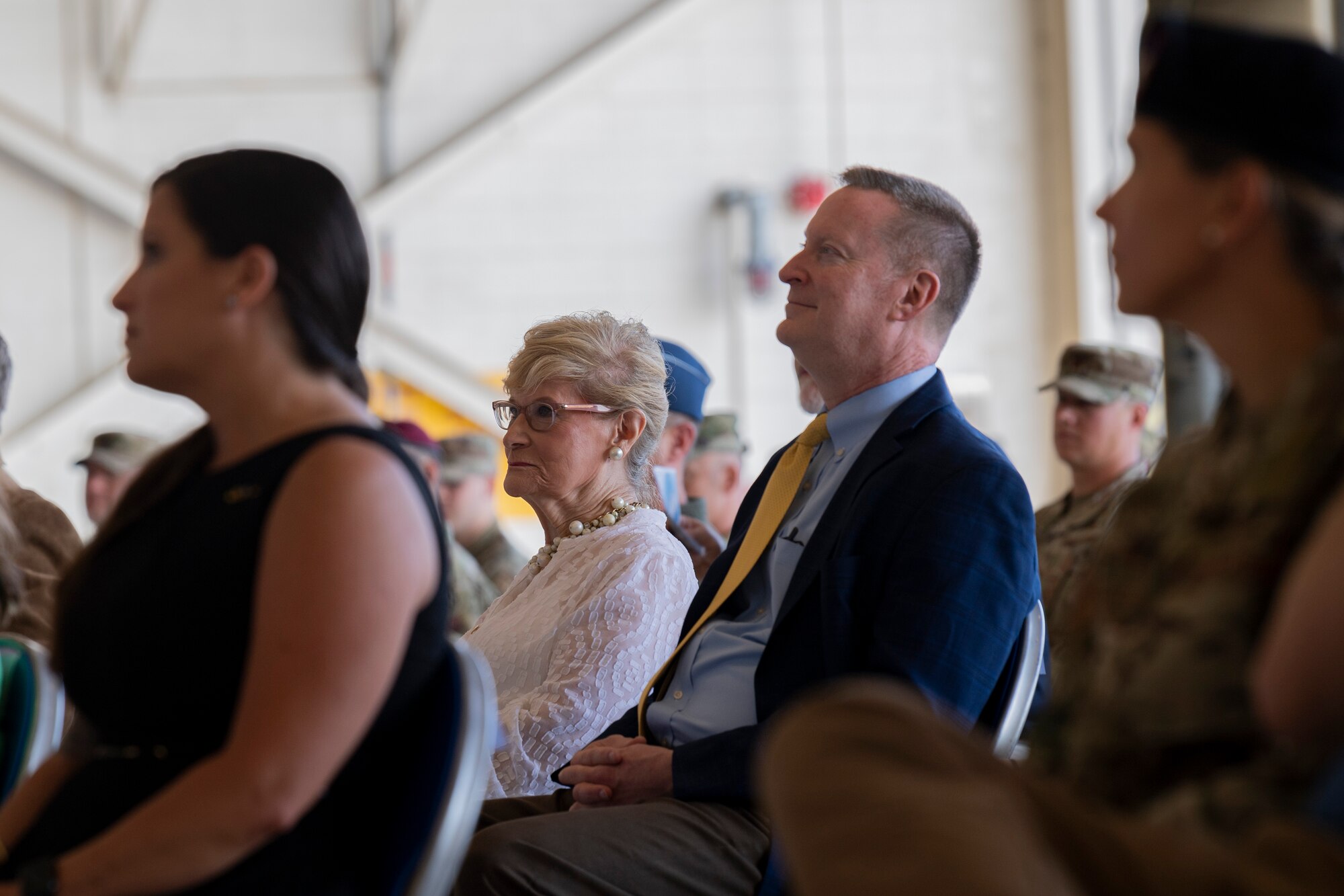 A photo of community members at a change of command ceremony