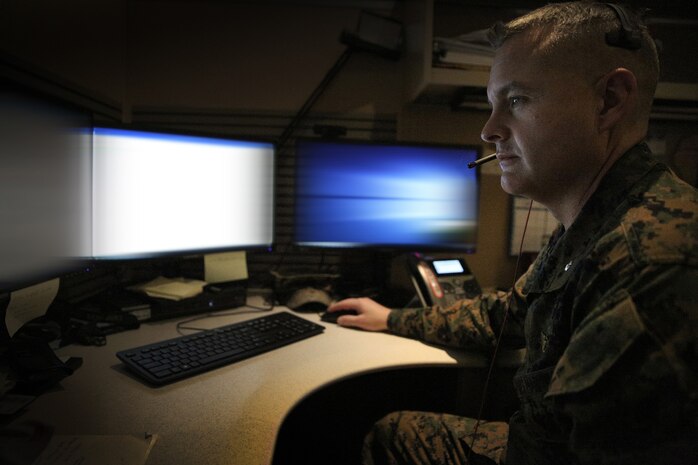 A U.S. Cyber Command, Cyber National Mission Force member works while attending a virtual meeting at Fort George G. Meade Md., Jan. 22, 2021.