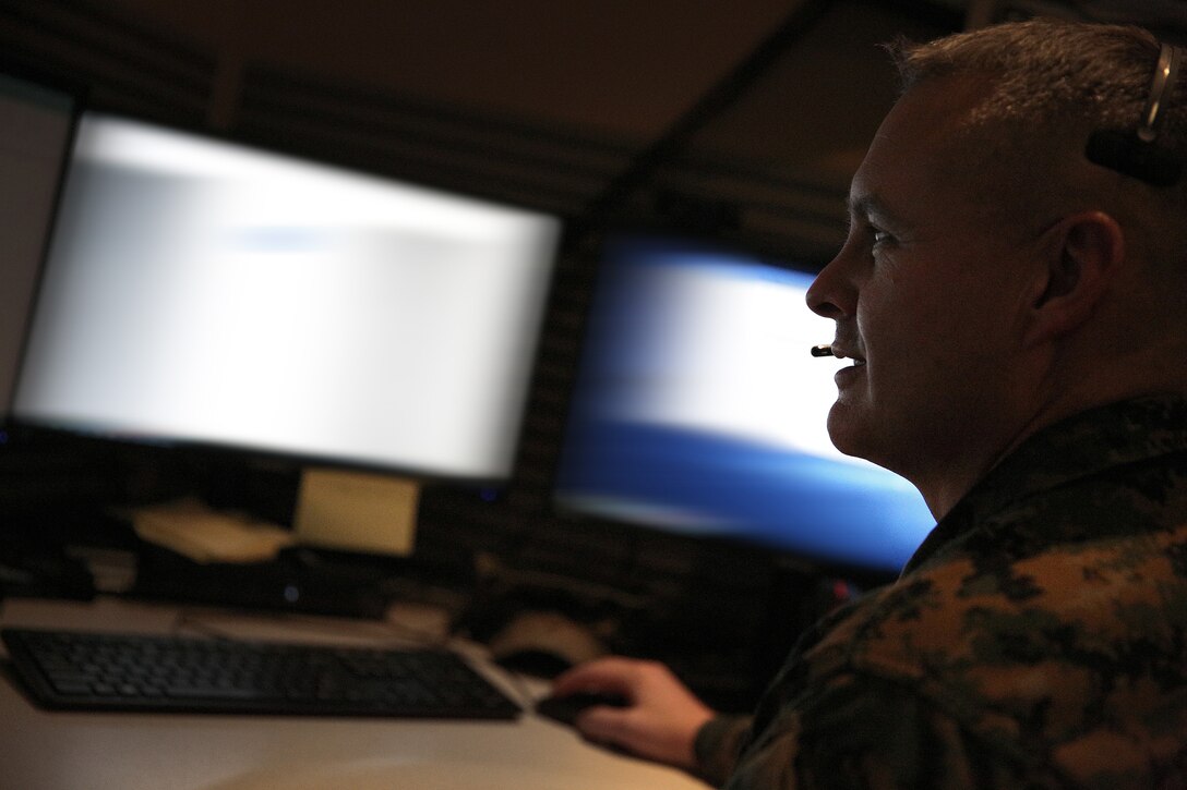 A U.S. Cyber Command, Cyber National Mission Force member works while attending a virtual meeting at Fort George G. Meade Md., Jan. 22, 2021.