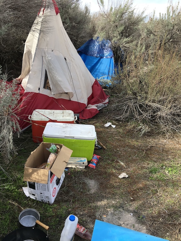 U.S. Army Corps of Engineers officials find debris and waste at an abandoned campsite, April 2, 2018 at Threemile Park near John Day Dam, Ore. 

Due to similar issues, as well as other safety and public health concerns, the Corps has transitioned from primitive camping to day-use only in some areas, and a maximum of seven days of primitive camping within a 30-day consecutive period.