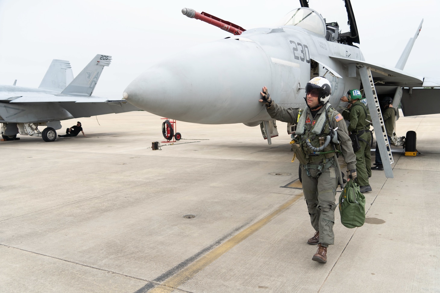 Capt. Brian C. Becker, Commander, Strike Fighter Wing Atlantic (CSFWL), prepares for his last flight with CSFWL onboard Naval Air Station Oceana.