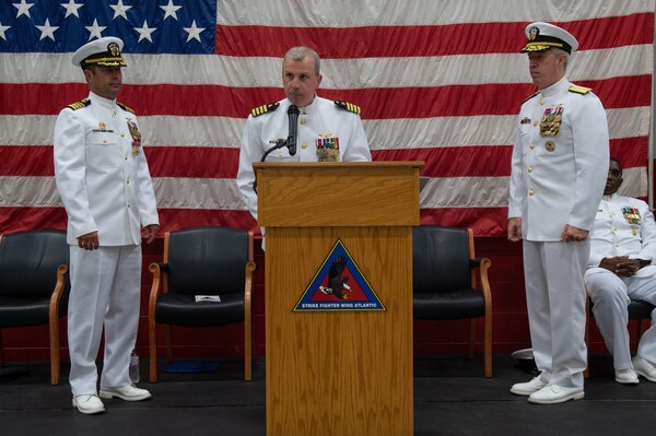 Capt. Ted C. Ricciardella, Commander, Strike Fighter Wing Atlantic (CSFWL), speaks during his change of command ceremony onboard Naval Air Station Oceana. Ricciardella assumes command as commodore of CSFWL from Capt. Brian C. Becker.