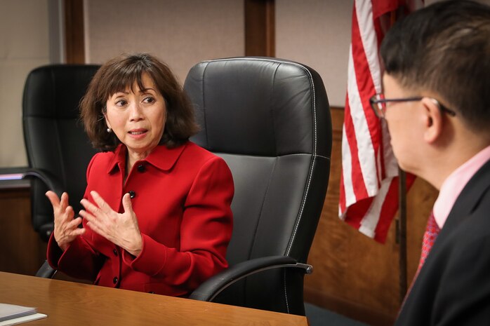 Naval Sea Systems Command (NAVSEA) Executive Director Giao Phan responds to questions during the virtual NAVSEA Asian American Pacific Islander (AAPI) event hosted onboard Naval Surface Warfare Center Indian Head Division (NSWC IHD), May 11. NSWC IHD AAPI Leadership Champion Frank Tse (right) read questions submitted from employees across NAVSEA Warfare Centers.