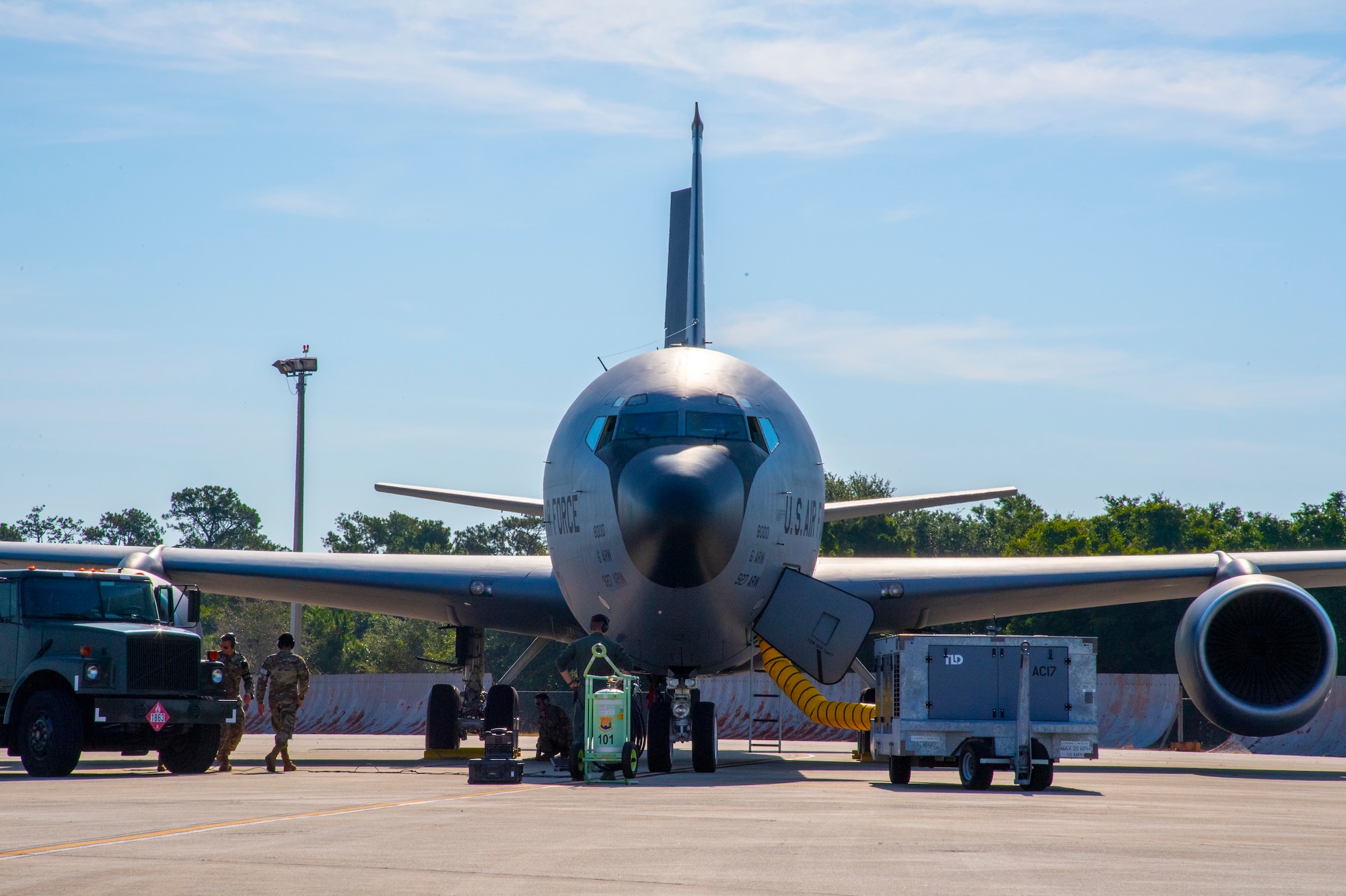 Maintainers from the 6th Aircraft Maintenance Squadron (AMXS) conduct a hot pit refueling on a KC-135 Stratotanker aircraft at MacDill Air Force Base, Florida, May 25, 2021. The 6th AMXS Airmen made history since it was the first time a KC-135 hot pit refueling was conducted at MacDill. (U.S. Air Force photo by Airman 1st Class Hiram Martinez)