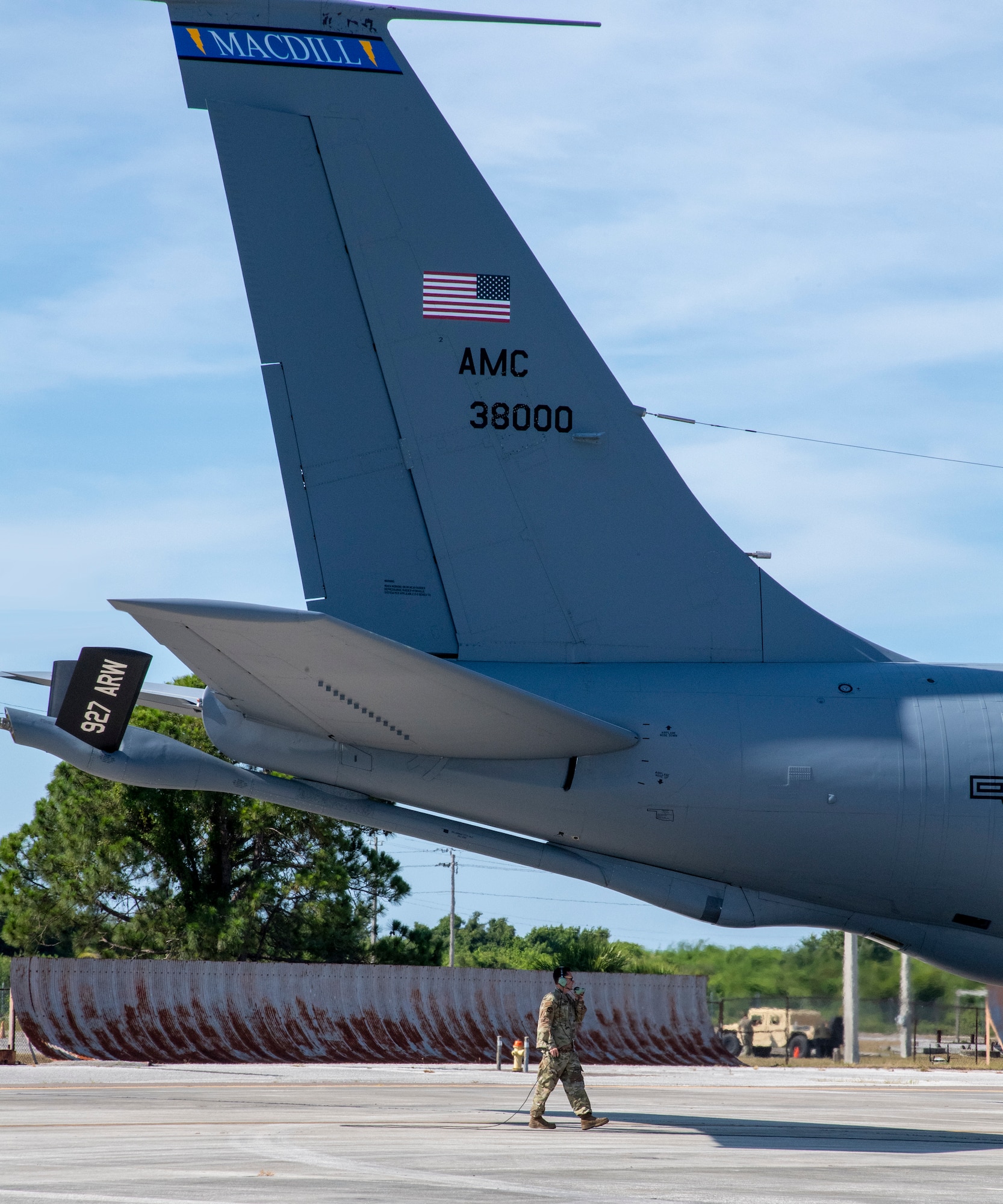 A maintainer with the 6th Aircraft Maintenance Squadron (AMXS) conducts a check during a hot pit refueling at MacDill Air Force Base, Florida, May 25, 2021. The 6th AMXS Airmen made history since it was the first time a KC-135 Stratotanker aircraft hot pit refueling was conducted at MacDill. (U.S. Air Force photo by Airman 1st Class Hiram Martinez)