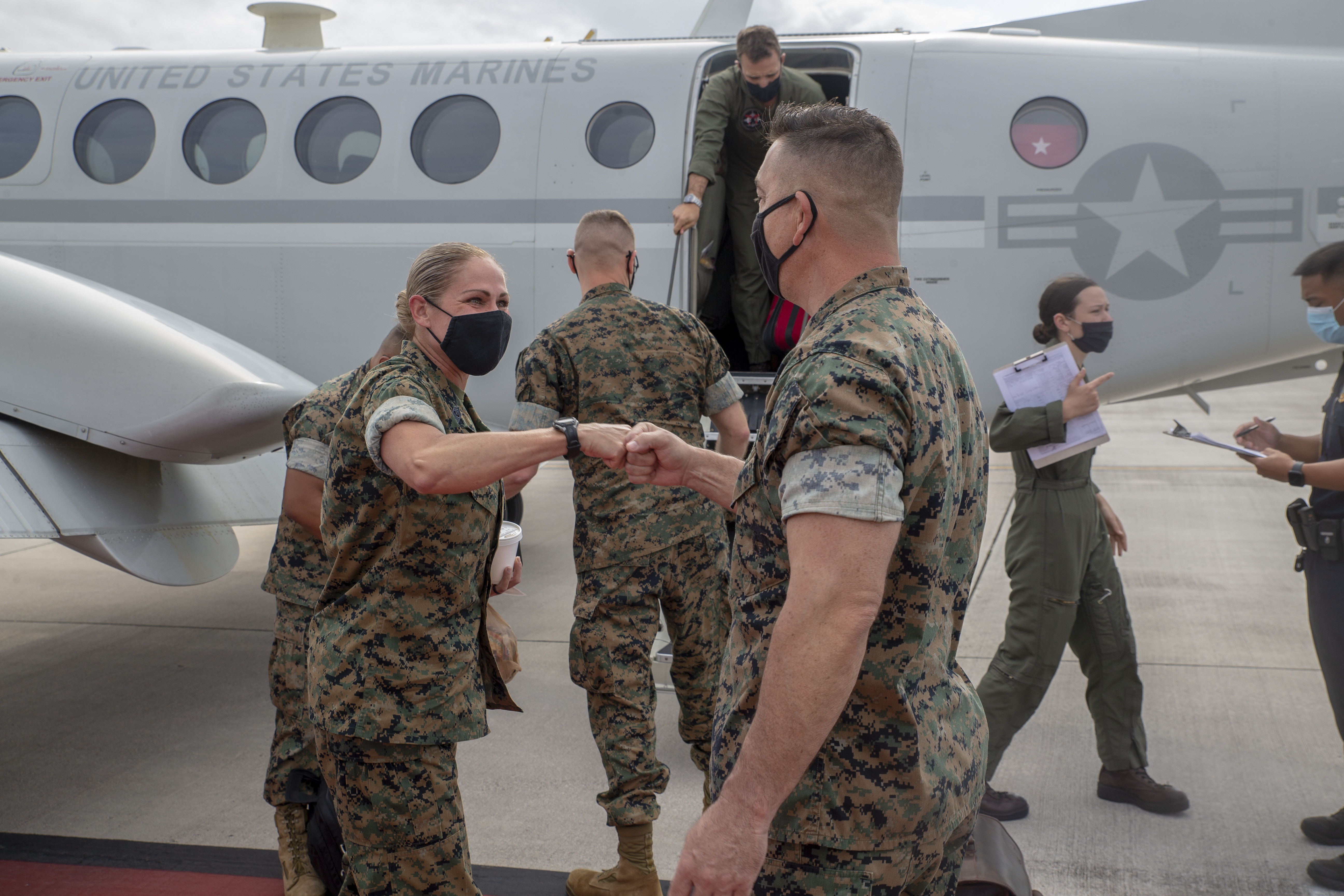 Lt. Col. Tate Buntz, the Marine Corps Base (MCB) Camp Blaz Operations Officer, greets Sgt. Maj. Joy Kitashima, the Marine Corps Installations Pacific Sergeant Major, during a visit to MCB Camp Blaz, May 16, 2021.