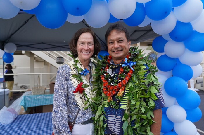 Mr. Kaipo Crowell celebrates his retirement from Pearl Harbor Naval Shipyard and Intermediate Maintenance Facility with his wife, Mrs. Peggy Crowell.