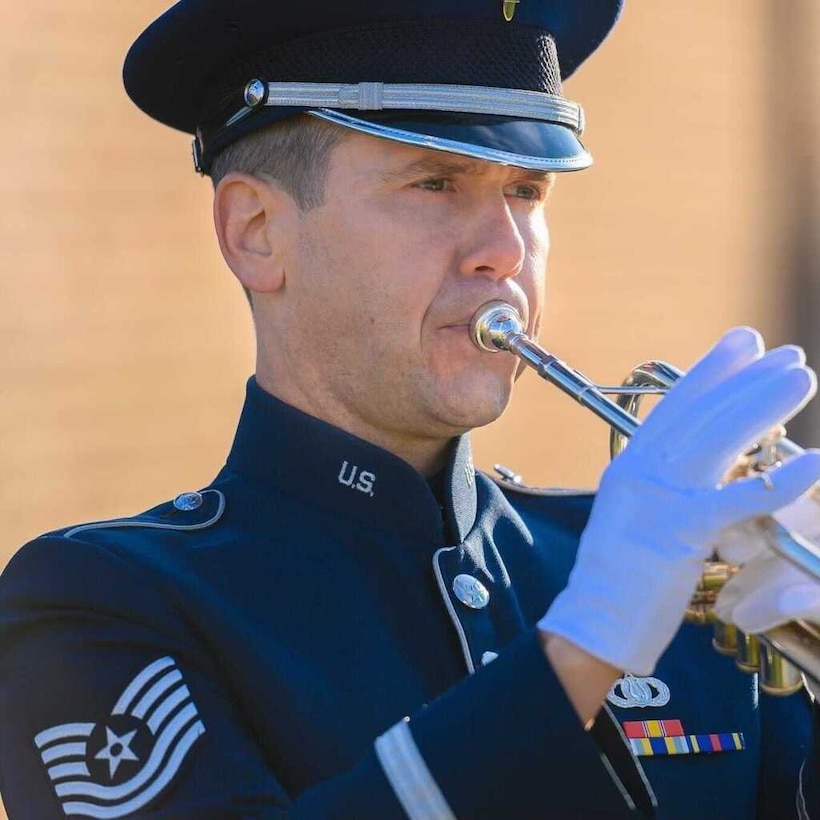 Trumpeter Technical Sgt. Jason Covey performs during a summer day with the Ceremonial Brass (U.S. Air Force photo by Senior Master Sgt. (sel) Grant Langford).