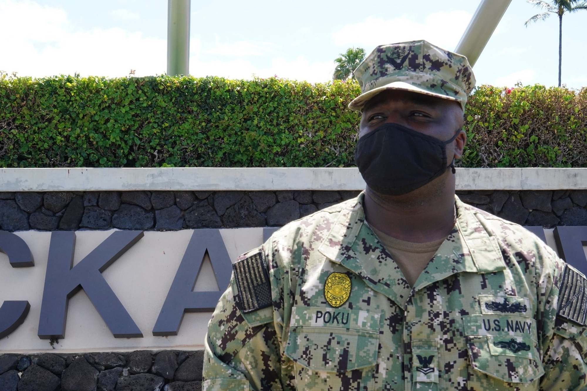 U.S. Navy Master at Arms Petty Officer 2nd Class Samuel A. Poku Jr., 647th Security Forces Squadron Police Services leading petty officer, oversees all traffic citations and reports at Joint Base Pearl Harbor-Hickam, Hawaii, May 12, 2021. The 647th SFS ensures the safety of people, property, and resources on the joint installation. (U.S. Air Force photo by Tech. Sgt. Nicholas Brown)
