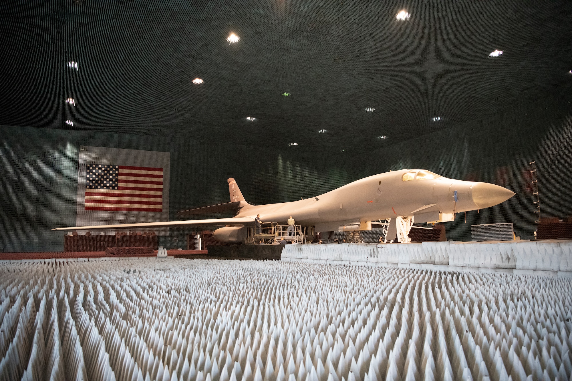 Ground crews move a B-1B Lancer into position at the Benefield Anechoic Facility on Edwards Air Force Base, California, May 20. The Lancer, from the 337th Test and Evaluation Squadron, 53rd Wing, out of Dyess Air Force Base, Texas, will be used to conduct testing of PFS 6.42. (Air Force photo by 1st Lt. Christine Saunders)