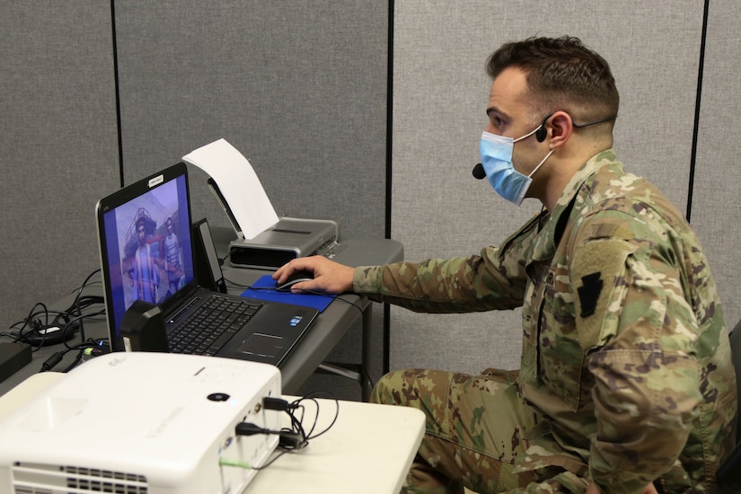 Spc. Brent Martin, a human intelligence analyst with the 28th Infantry Division, uses the Intelligence Electronics Warfare Tactical Proficiency Trainer (IEWTPT) April 17, 2021, at Fort Indiantown Gap, Pa.