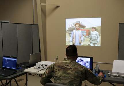 Spc. Brent Martin, a human intelligence analyst with the 28th Infantry Division, uses the Intelligence Electronics Warfare Tactical Proficiency Trainer (IEWTPT) April 17, 2021, at Fort Indiantown Gap, Pa.