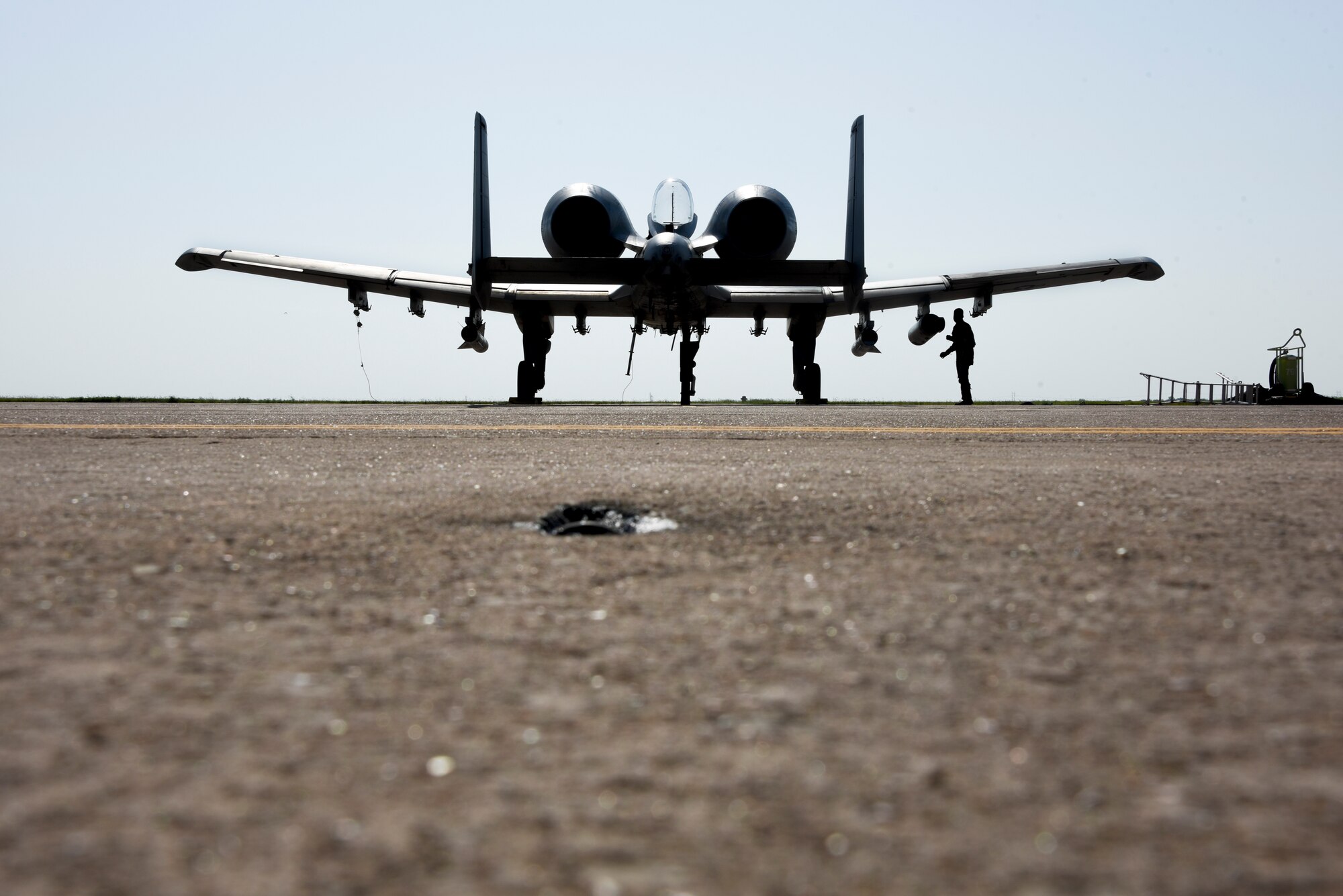 Pilot performs pre-flight walk around of the A-10