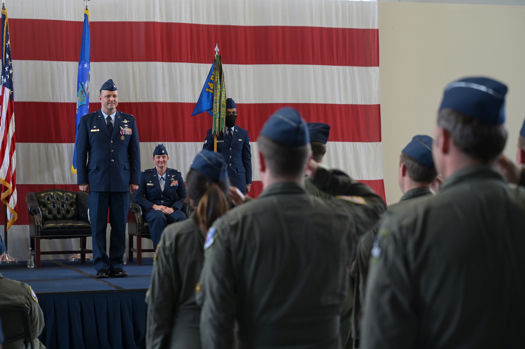 A formation comprised of Airmen from the 37th Flying Training Squadron salute Lt. Col. Aaron Tillman, outgoing 37th FTS commander during a change of command ceremony May 27, 2021, on Columbus Air Force Base, Miss. The T-6A Texan II is a single-engine, two-seat primary trainer designed to train Joint Primary Pilot Training, or JPPT, students in basic flying skills common to U.S. Air Force and Navy pilots. (U.S. Air Force photo by Senior Airman Jake Jacobsen)