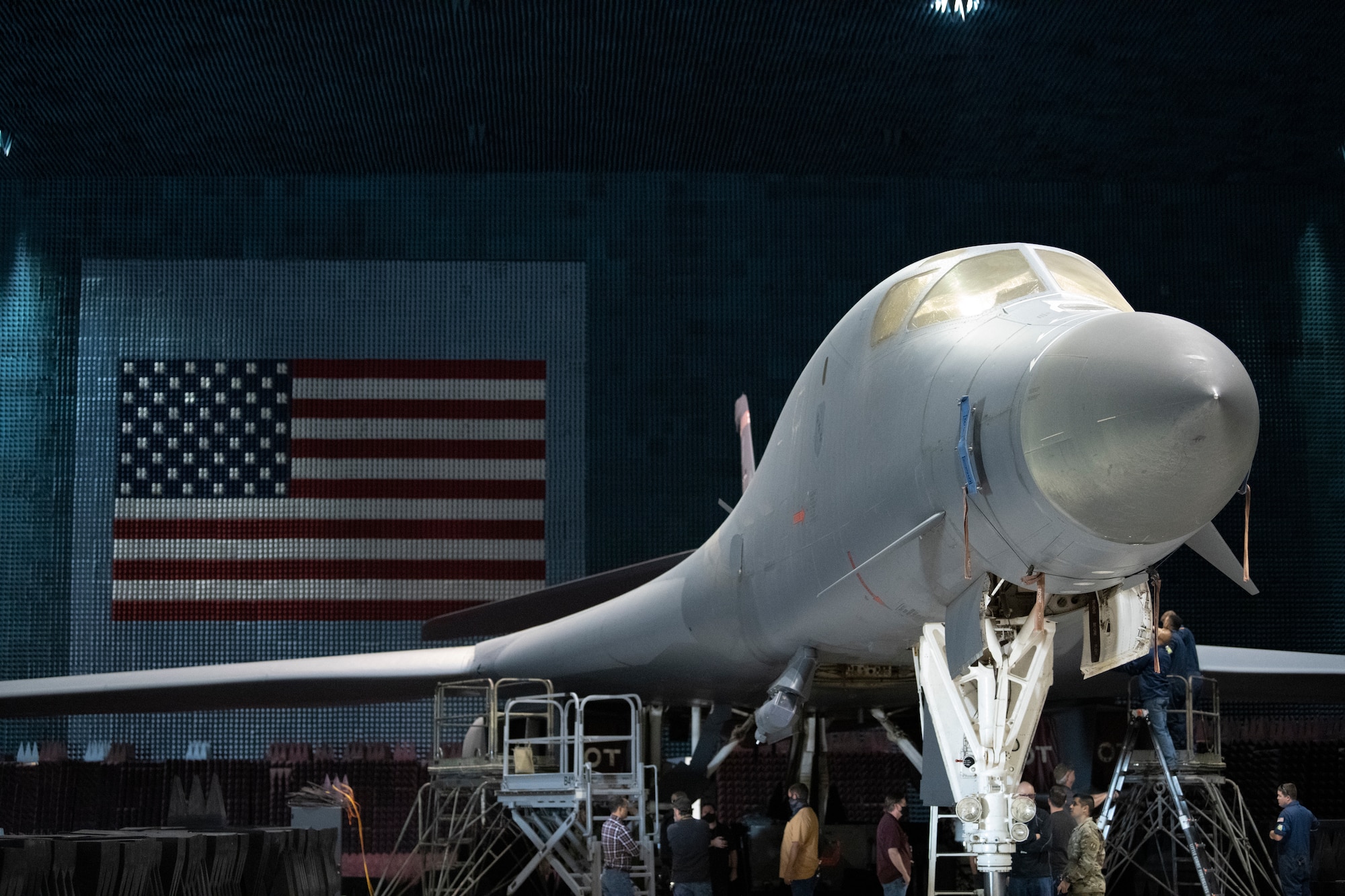 Ground crews move a B-1B Lancer into position at the Benefield Anechoic Facility on Edwards Air Force Base, California, May 20. The Lancer, from the 337th Test and Evaluation Squadron, 53rd Wing, out of Dyess Air Force Base, Texas, will be used to conduct testing of PFS 6.42. (Air Force photo by 1st Lt. Christine Saunders)