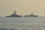 ARABIAN GULF (May 24, 2021) – Patrol boat USCGC Maui (WPB 1304), left, and fast response cutter USCGC Robert Goldman (WPC 1142) transit the Arabian Gulf en route to Bahrain, May 24. Robert Goldman and USCGC Charles Moulthrope (WPC 1141) are the newest additions to Patrol Forces Southwest Asia (PATFORSWA), which is comprised of six 110' cutters, the Maritime Engagement Team, shore side support personnel, and is the Coast Guard's largest unit outside of the U.S. playing a key role in supporting Navy security cooperation, maritime security, and maritime infrastructure protection operations in the U.S. 5th Fleet area of operations. (U.S. Coast Guard photo by Seaman Logan Kaczmarek)