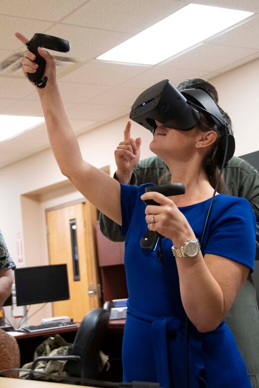 Civilian uses virtual reality trainer system.