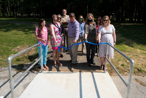 Officials with the Tennessee Health Department, Sumner County Health Department, Sumner County, and U.S. Army Corps of Engineers Nashville District dedicate a .5-mile exercise trail May 25, 2021 at Rockland Recreation Area on the shoreline of Old Hickory Lake. The ribbon cutting culminated a joint effort to construct a loop fitness trail to provide a pathway for people to safely exercise at the USACE-operated project. (USACE photo by Lee Roberts)