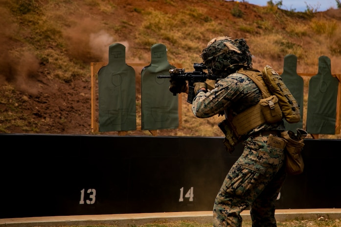 U.S. Marine Corps Cpl. Bryan Fink, a squad leader with Lima Company, 3rd Battalion, 1st Marine Regiment, participates in a live fire range as part of the Enhanced Infantry Squad Leaders Course, Marine Corps Base Hawaii, May 24, 2021. This course is an experimental proof of concept, with the intent of modernizing training and providing squad leaders with new capabilities. (U.S. Marine Corps photo by Lance Cpl. Terry Stennett III)