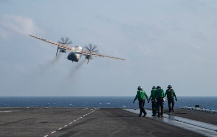 A C-2A Greyhound, attached to the "Greyhawks" of Command and Control Squadron (VAW) 120, takes off from the flight deck of the Nimitz-class aircraft carrier USS Harry S. Truman (CVN 75) during carrier qualifications after completing an extended incremental availability.