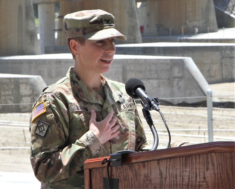 Col. Julie Balten, U.S. Army Corps of Engineers Los Angeles District commander, welcomes guests representing local, county, state and federal agencies at the May 27 ribbon-cutting ceremony for the BSNF Railroad Bridge Pier Protection Project in Corona, California. The purpose of the project is to minimize risk to the bridge in flood conditions and during increased water releases from Prado Dam resulting from periods of heavy rainfall.