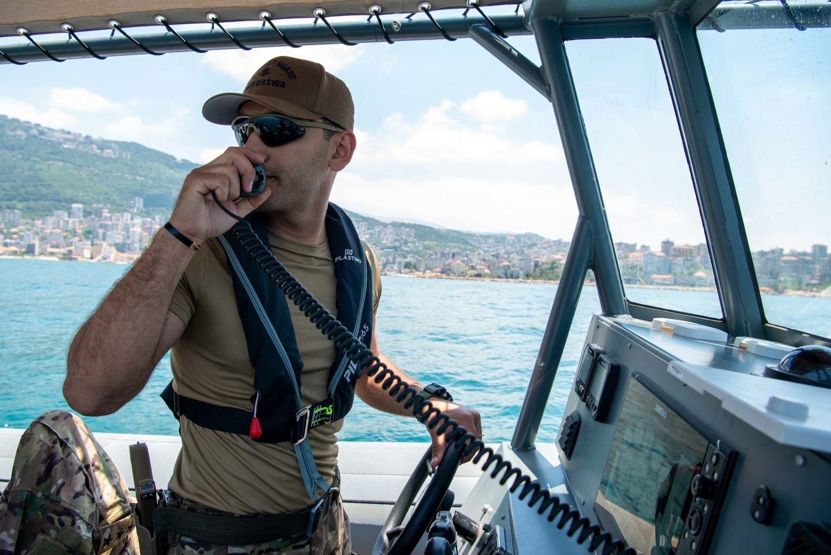 210518-N-KC128-0192 BERUIT (May 18, 2021) – A member of the Lebanese Armed Forces operates a rigid-hull inflatable boat in the Mediterranean Sea during small boat operations as part of exercise Resolute Union 21 at Jounieh Naval Base, Lebanon, May 18. Resolute Union 21 is an annual, bilateral explosive ordnance disposal and maritime security exercise between U.S. 5th Fleet and Lebanese Armed Forces to enhance mutual capabilities and interoperability. (U.S. Navy photo by Mass Communication Specialist 1st Class Daniel Hinton)