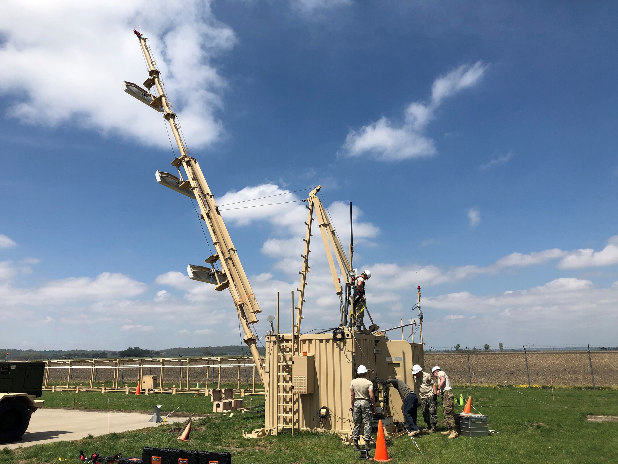 Members of the 53rd and 270th Air Traffic Control Squadrons participate in hands-on Deployable Instrument Landing Systems training at Rosecrans Air National Guard Base in St Joseph, Mo., in early 2019. The D-ILS vastly improves warfighter’s abilities to land in austere environments and low-visibility conditions. (Courtesy photo)
