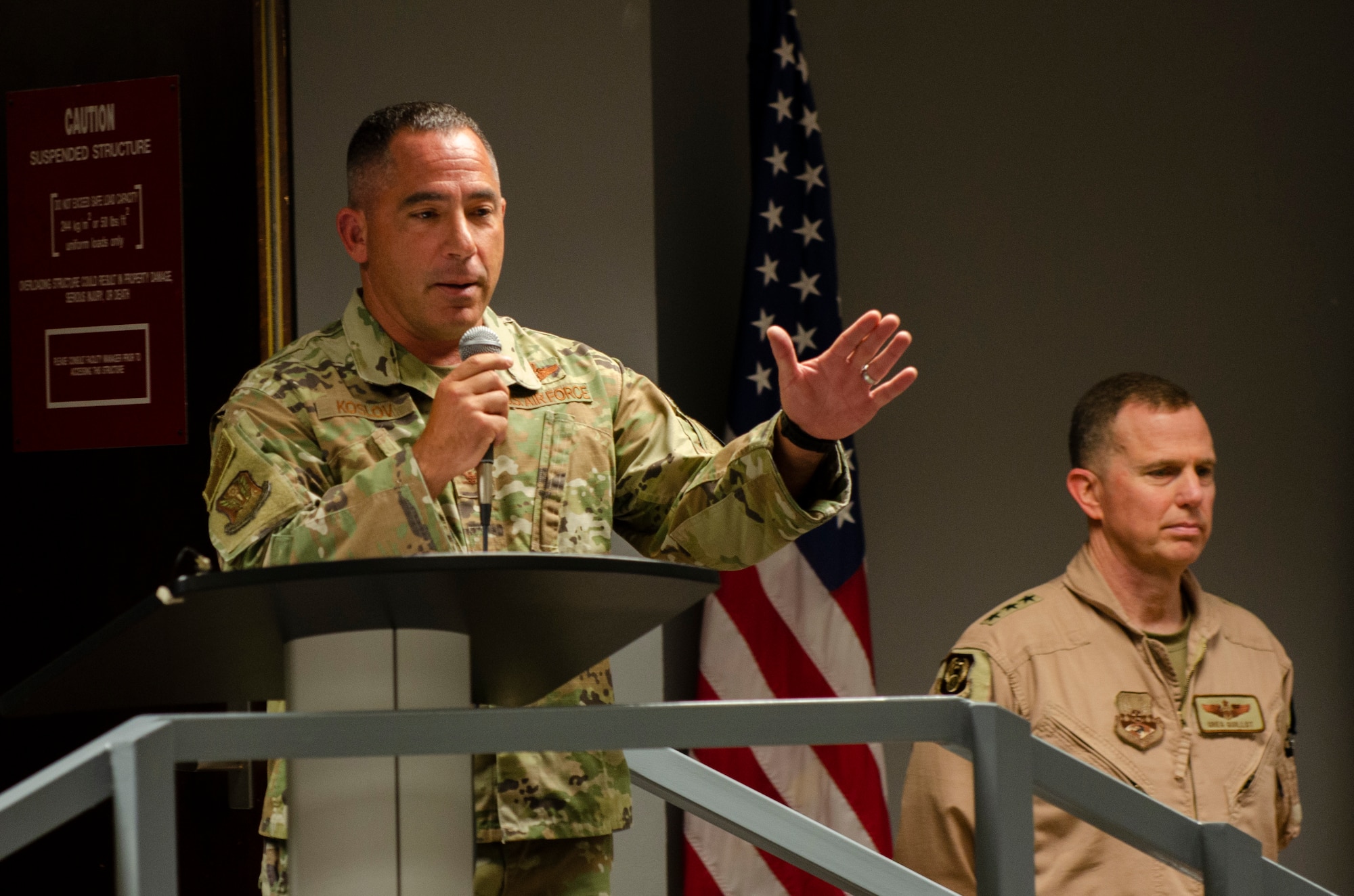 U.S. Air Force Col. Joshua Koslov, 609th Air Operations Center commander, speaks during the 609th AOC change of command ceremony Al Udeid Air Base, Qatar, May 27, 2021. The Airmen of the 609th AOC work alongside joint and international partners from 18 nations to plan, produce, and execute the daily Air Tasking Order on behalf of Guillot, who also serves as the Combined Forces Air Component Commander. (U.S. Air Force photo by Tech. Sgt. Dylan Nuckolls)