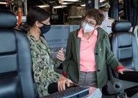 210528-N-WU807-1090 APRA HARBOR, Guam (May 28, 2021) Lt j.g. Amber Mendez, left, from Carlsbad, Calif., gives German Defense Minister Annegret Kramp-Karrenbauer a tour of the pilot house aboard Independence-variant littoral combat ship USS Charleston (LCS 18), May 28. Charleston, part of Destroyer Squadron Seven, is on a rotational deployment operating in the U.S. 7th fleet area of operations to enhance interoperability with partners and serve as a ready-response force in support of a free and open Indo-Pacific region. (U.S. Navy photo by Mass Communication Specialist 3rd Class Adam Butler)