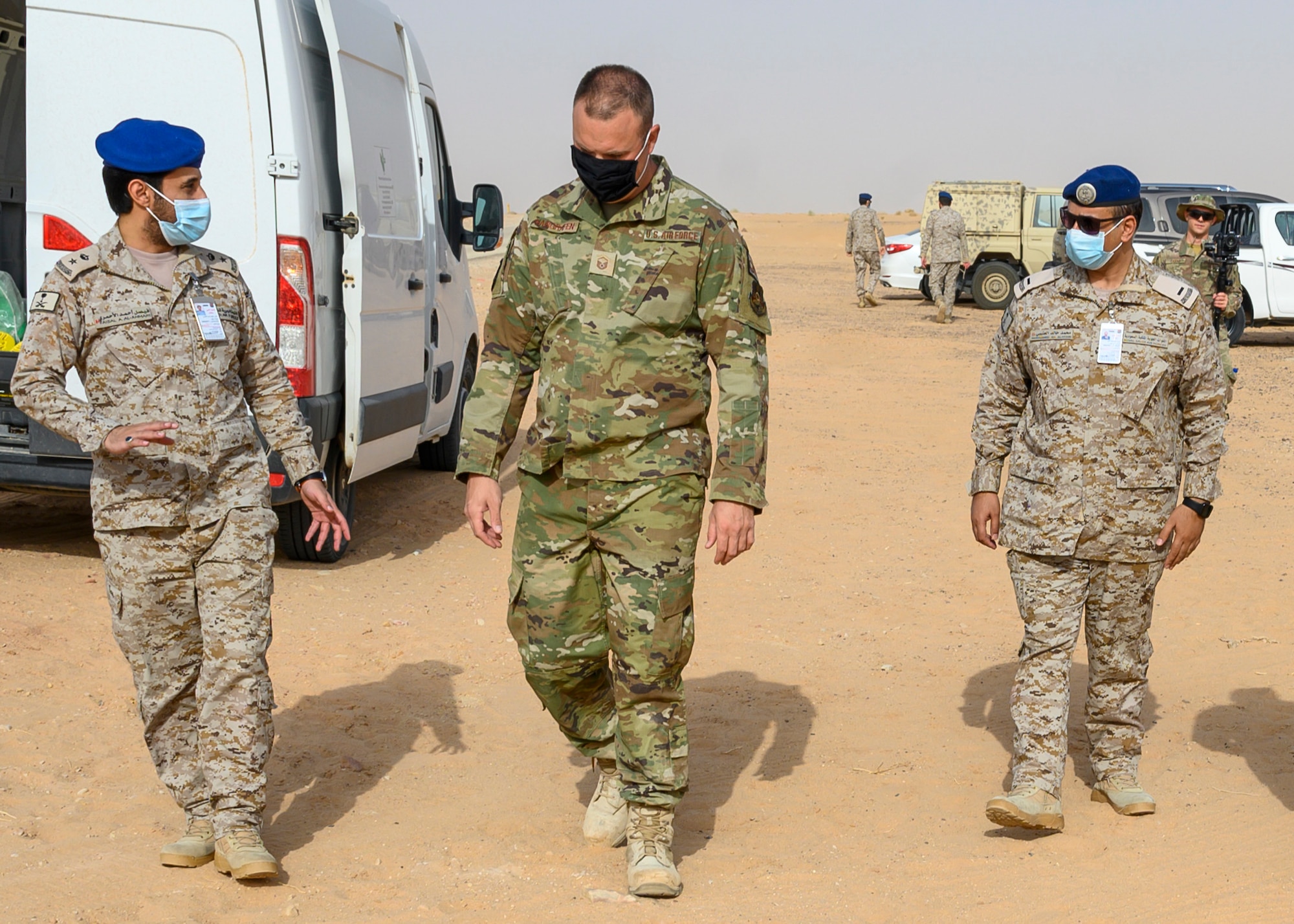 U.S. Air Force Master Sgt. Nathan Hargrafen, 378th Civil Engineer Squadron emergency management flight chief, explains the steps of a CBRN exercise with members of the Royal Saudi Air Force, Prince Sultan Air Base, Kingdom of Saudi Arabia, May 26, 2021. The combined exercise demonstrates the emergency management integration between USAF and RSAF CBRN response units while also familiarizing each unit with the other’s techniques and procedures. (U.S. Air Force photo by Senior Airman Samuel Earick)
