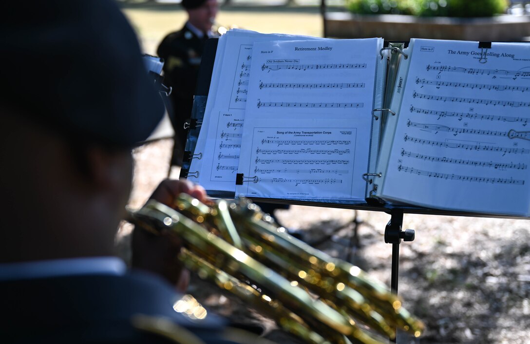Members of the U.S. Army Training and Doctrine Command band, performs during the Memorial Day retreat ceremony at Joint Base Langley-Eustis, Virginia, May 27, 2021. The band members also opened at country music artist Austin Moody’s concert later that evening. (U.S. Air Force photo by Senior Airman Sarah Dowe)