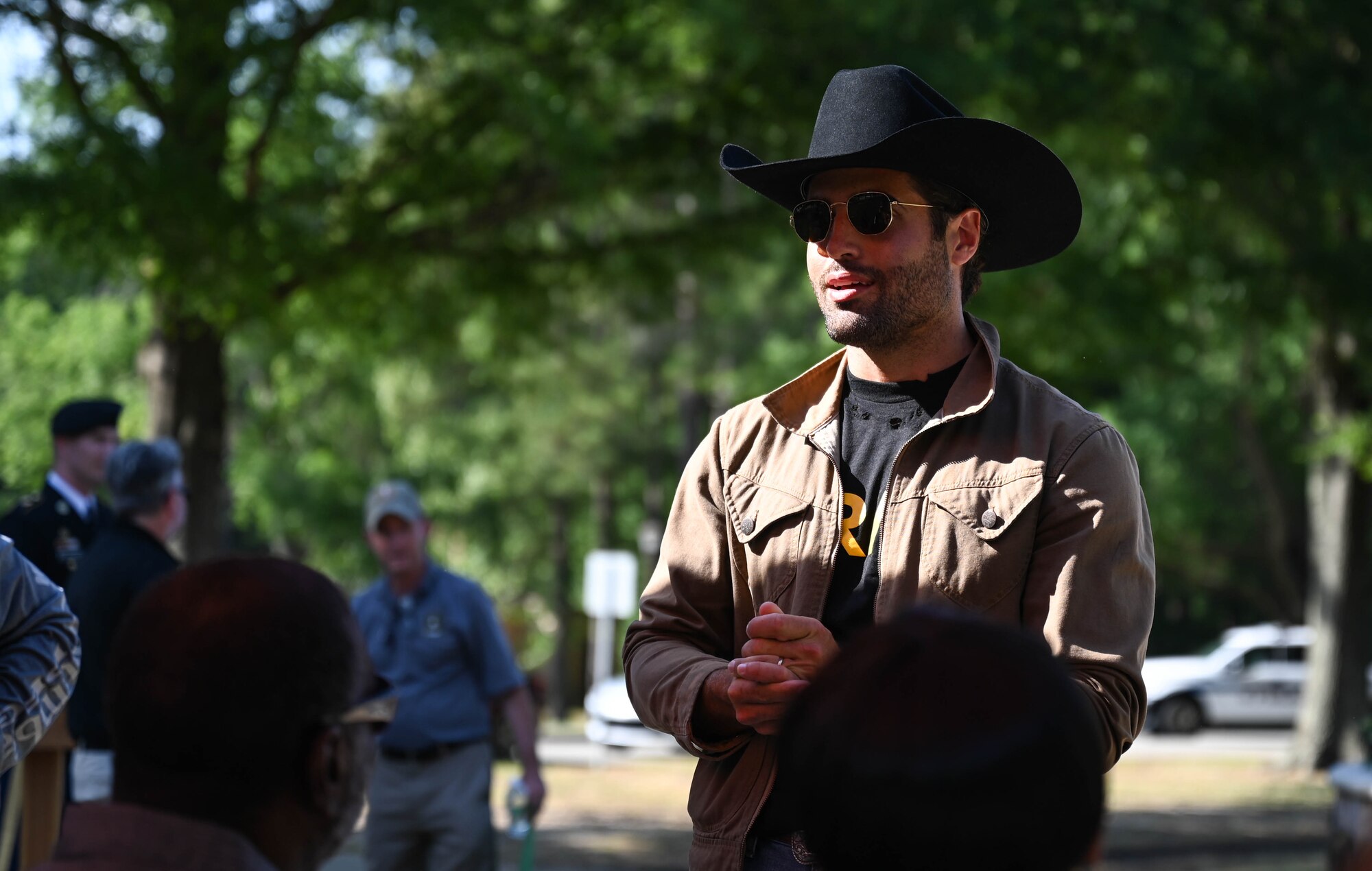 Country music artist Austin Moody, greets and thanks Gold Star family members after the Memorial Day retreat ceremony at Joint Base Langley-Eustis, Virginia, May 27, 2021. Moody performed a concert afterwards at the U.S. Army Training and Doctrine Command stage. (U.S. Air Force photo by Senior Airman Sarah Dowe)