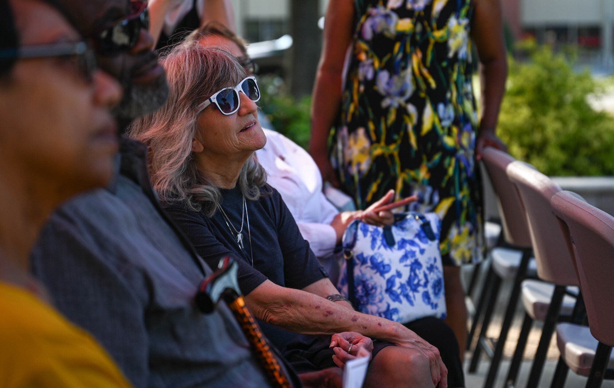 Gold Star family members watch the Memorial Day retreat ceremony at Joint Base Langley-Eustis, Virginia, May 27, 2021. Gold Star families are the immediate relatives of military service members who lost their lives in defense of the United States. (U.S. Air Force photo by Senior Airman Sarah Dowe)