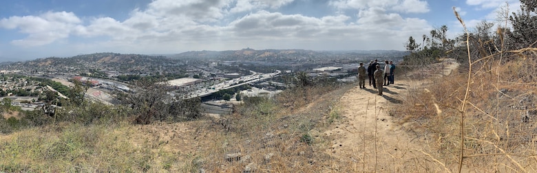 U.S. Army Corps of Engineers South Pacific Division commander Brig. Gen. Paul Owen and the Corps' Los Angeles District team led by Col. Julie Balten have a panoramic view of the Los Angeles River from Elysium Park, May 26, during a visit to the District.