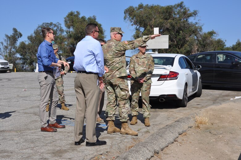 U.S. Army Corps of Engineers South Pacific Division Brig. Gen. Paul Owen indicates Corps' projects along the Los Angeles River, May 26, from Point Grand View in Elysium Park, Los Angeles. Owen was accompanied by Los Angeles District commander Col. Julie Balten and her team.