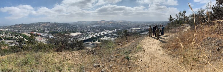 U.S. Army Corps of Engineers South Pacific Division commander Brig. Gen. Paul Owen and the Corps' Los Angeles District team led by Col. Julie Balten have a panoramic view of the Los Angeles River from Elysium Park, May 26, during a visit to the District.
