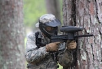 Air Force ROTC cadet takes aim during a field exercise in Puerto Rico.