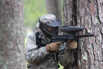 Air Force ROTC cadet takes aim during a field exercise in Puerto Rico.