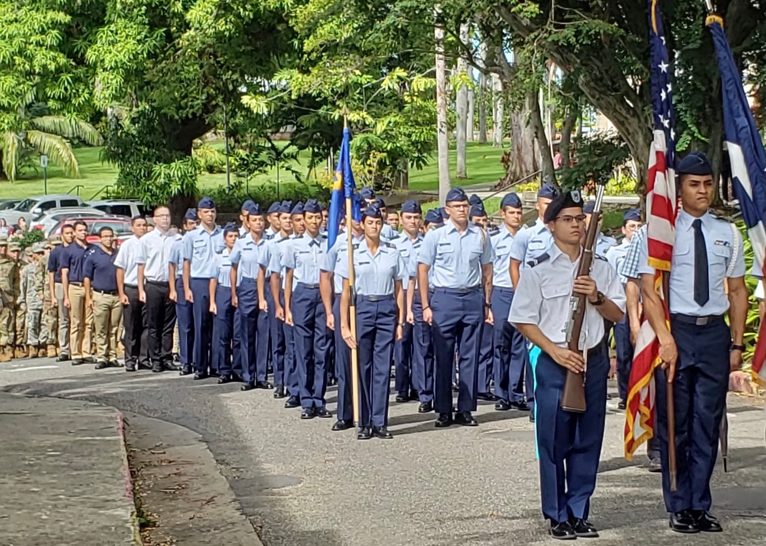 Air Force ROTC cadets stand in formation.